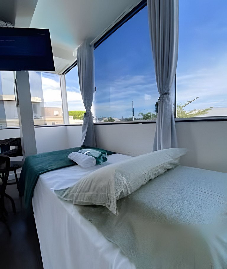 Studio com vista para a piscina | Ar e Cozinha