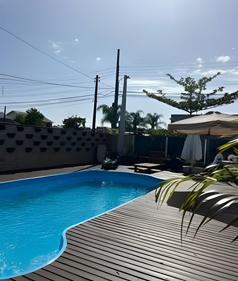 Apartamento no térreo com vista para a piscina