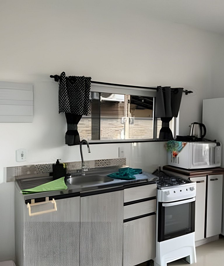 Apartamento no térreo com vista para a piscina