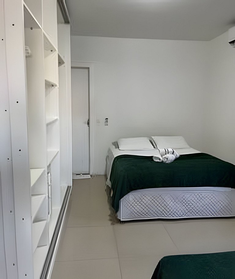 Apartamento no térreo com vista para a piscina