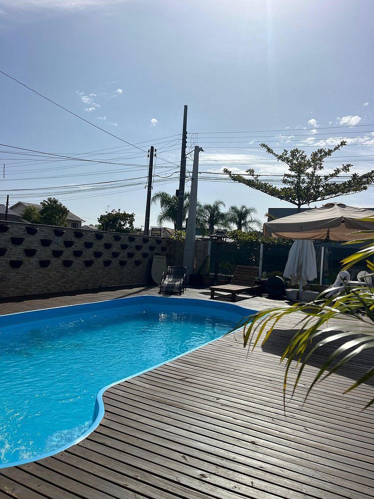 Studio com vista para a piscina | Ar e Cozinha